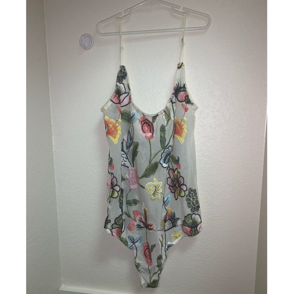 Lacy flower bodysuit